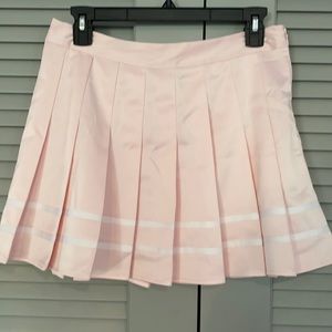 Pink pleated mini skirt